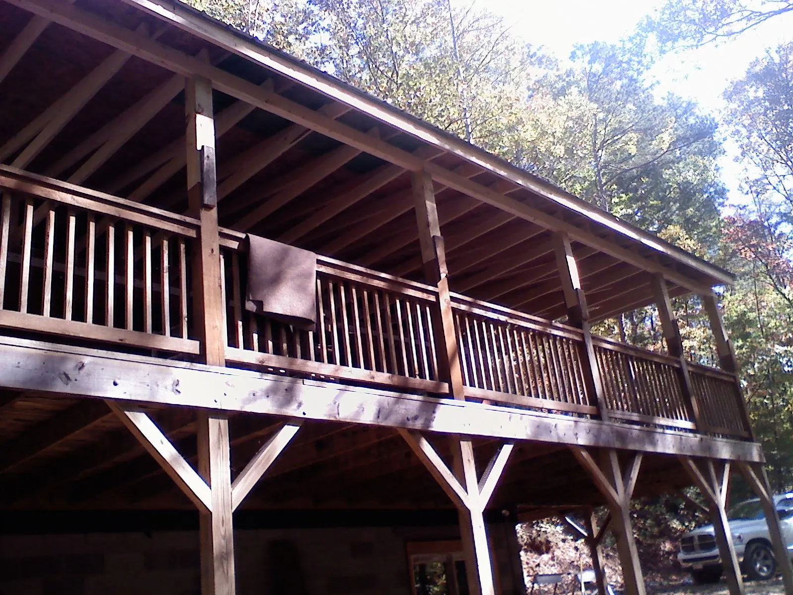 Timber framing under a new elevated porch and deck — Roof Leak Repair in Carencro by Roofing Brothers